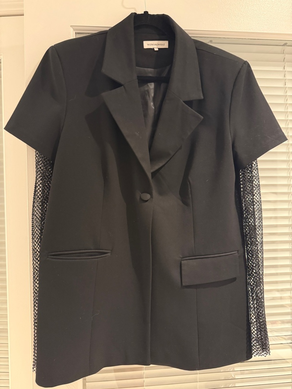 We wore what Black Blazer with long sleeves - Medium